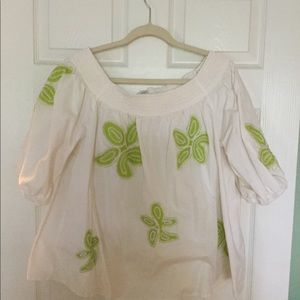 White top with green starfish.